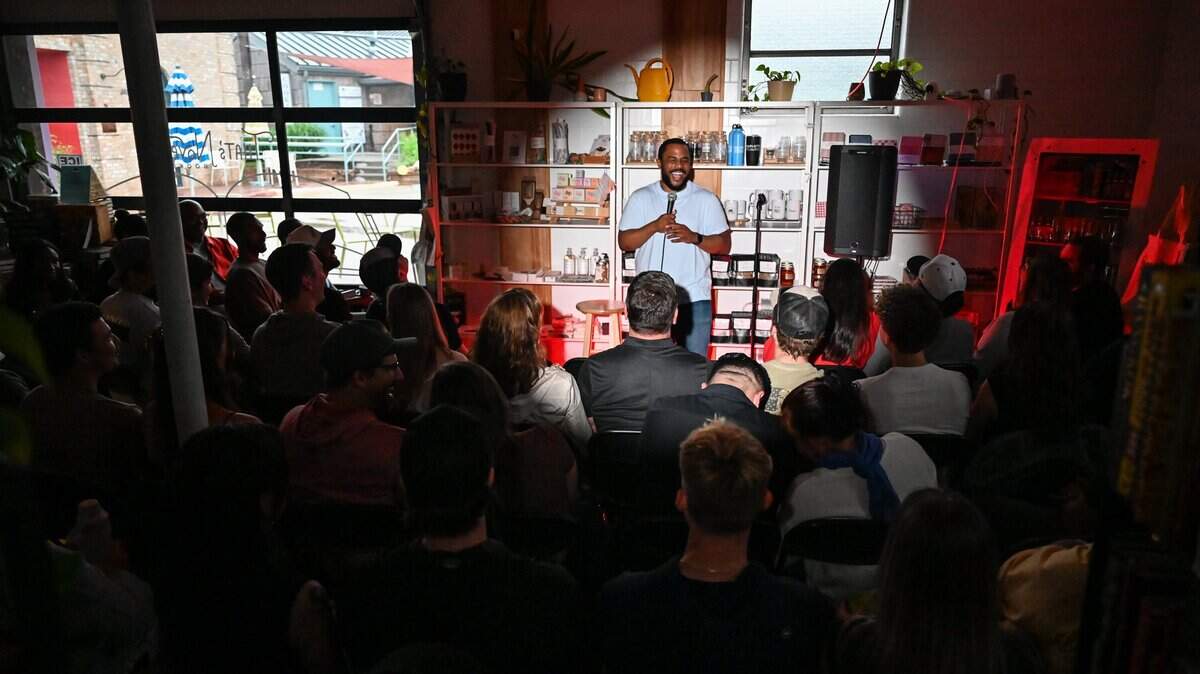 Local comedian and show host Don Garret performs his set during the Don't Tell Comedy pop-up at That's Novel Books at Camp North End in Charlotte on Saturday, May 23, 2026.