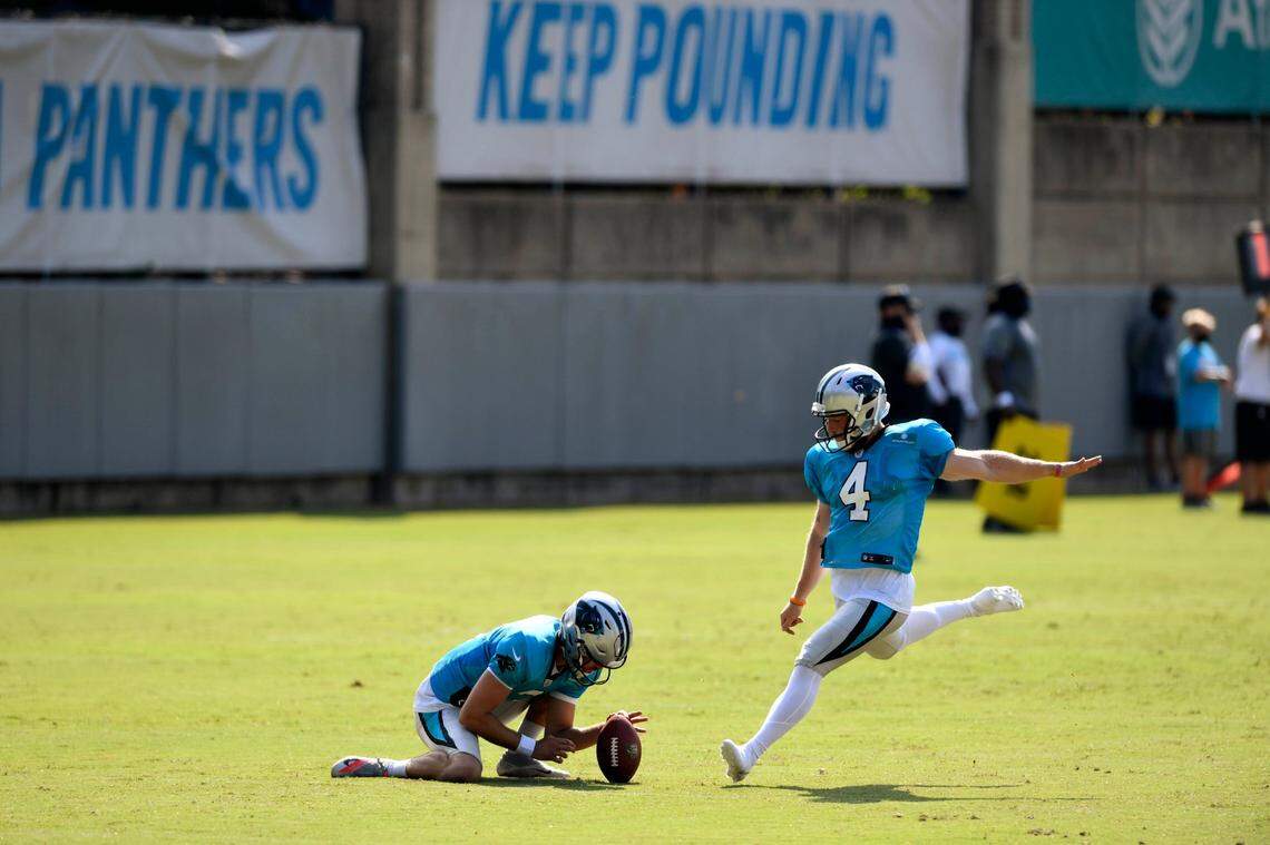Carolina Panthers place kicker Joey Slye (4) connects on a field goal attempt as punter Joseph Charlton (3) holds during training camp at the team’s training facility no Monday, August 17, 2020.