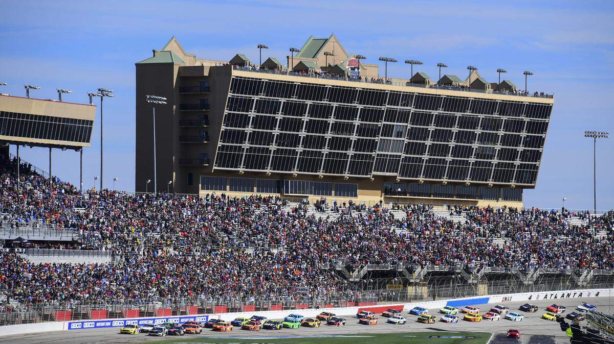 In this Feb. 24, 2019, file photo, a NASCAR Monster Energy NASCAR Cup Series auto race starts at Atlanta Motor Speedway in Hampton, Ga. NASCAR and IndyCar have each called off their races this weekend. NASCAR was scheduled to run Sunday at Atlanta Motor Speedway without spectators but said Friday, March 13, 2020, it is calling off this weekend and next week’s race at Homestead-Miami Speedway. IndyCar was scheduled to open its season Sunday on the streets of St. Petersburg, Florida, but suspended it’s season through the end of April.