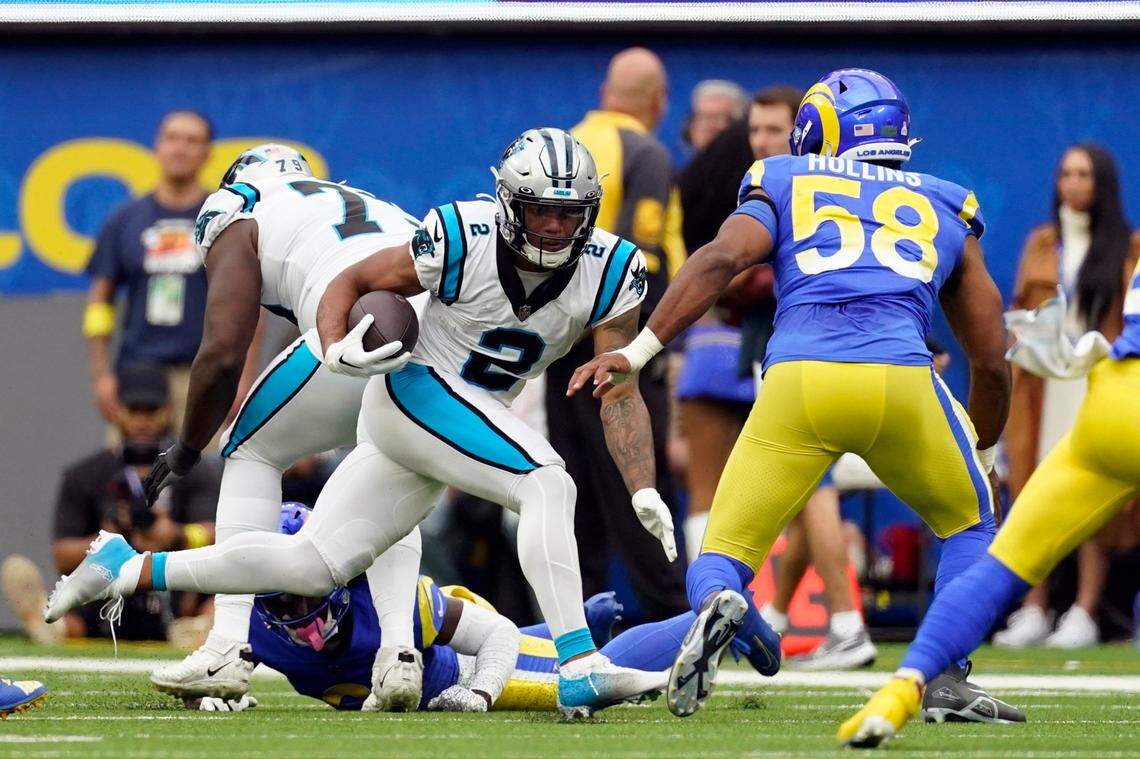 Carolina Panthers wide receiver DJ Moore (2) runs after a catch during the first half of an NFL football game against the Los Angeles Rams Sunday, Oct. 16, 2022, in Inglewood, Calif. (AP Photo/Ashley Landis)