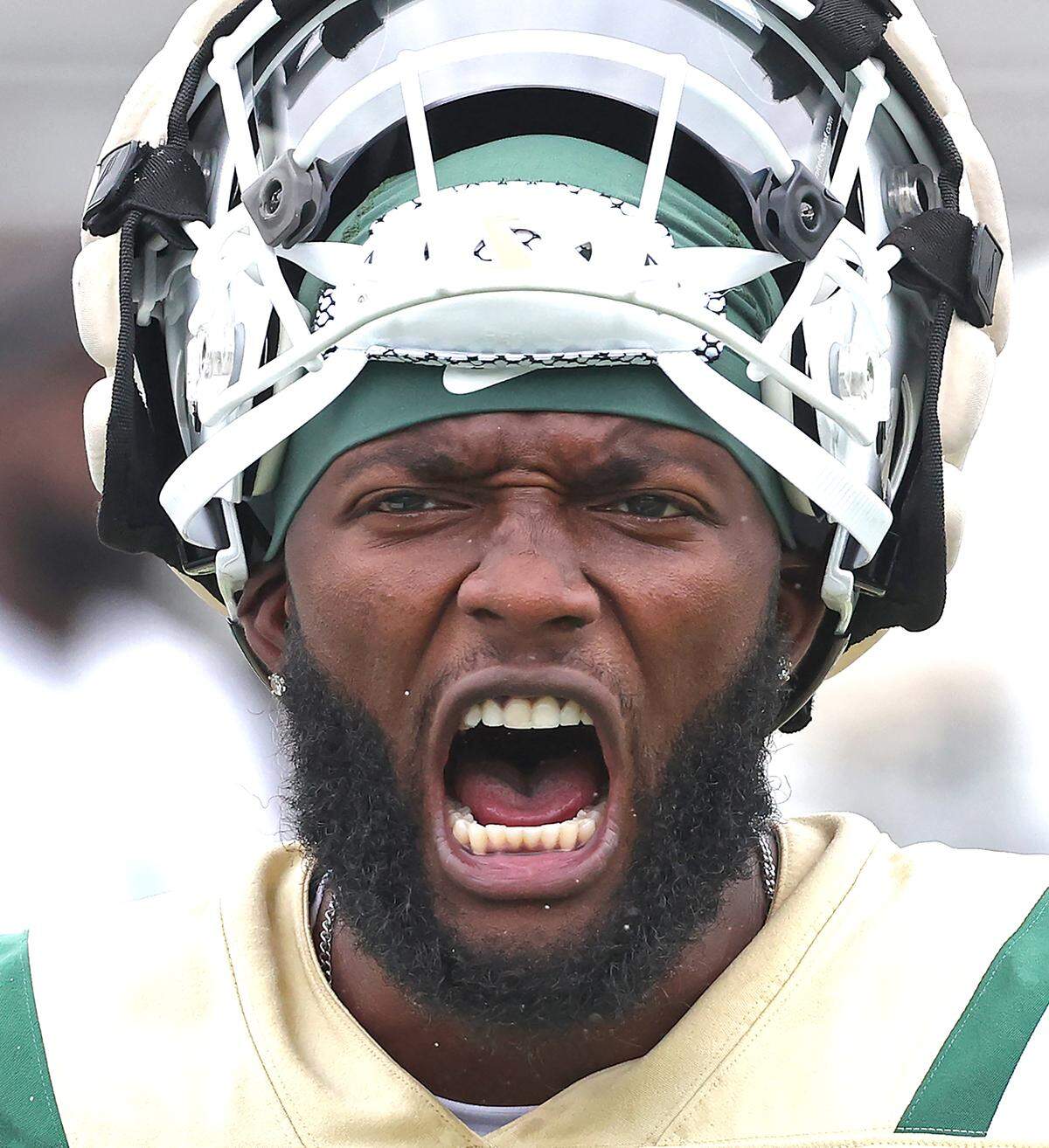 Charlotte 49ers quarterback Jalon Jones yells motivation to a teammate during the team’s first practice on Friday, August 4, 2023.