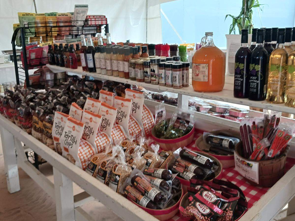 Tortilla chips, spices, cheeses and other NC products await visitors at the new temporary location of Josh’s Farmers Market on River Highway in Mooresville, NC., on Sept. 29, 2023.
