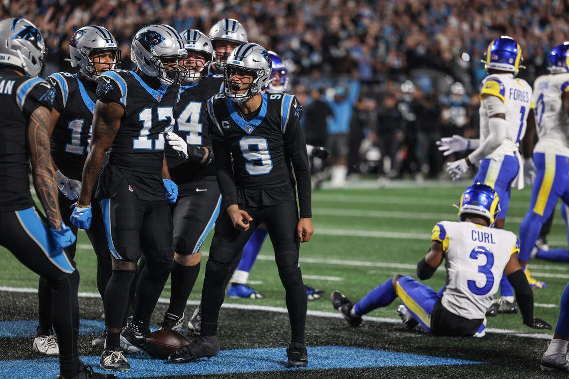 Panthers quarterback Bryce Young celebrates scoring a rushing touchdown during the the Wild Card playoff game against the Rams at Bank of America Stadium  in Charlotte on Saturday, January 10, 2026.