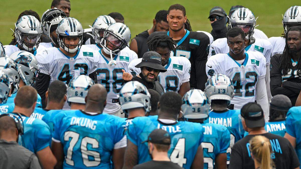 Carolina Panthers head coach Matt Rhule talks to his team during practice at Bank of America Stadium during training camp on Saturday, August 22, 2020.