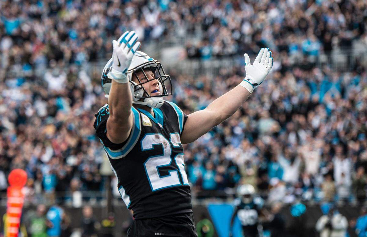 Carolina Panthers Christian McCaffrey celebrates a touchdown against the Washington Football Team at the Bank of America Stadium in Charlotte, N.C., on Sunday, November 21, 2021. 