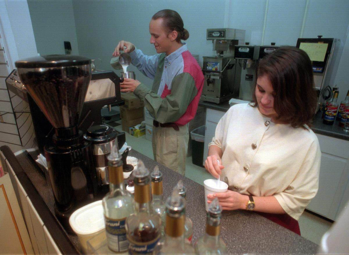 Banks Thomas, left and Kimberly Blackwell make coffee at Coffee, Tea & Thee in Eastridge Mall in Gastonia in December 1996.