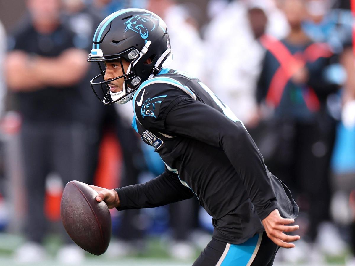 Carolina Panthers quarterback Bryce Young runs for a first down during action against the Kansas City Chiefs at Bank of America Stadium in Charlotte, NC on Sunday, November 24, 2024. The Chiefs defeated the Panthers 30-27.