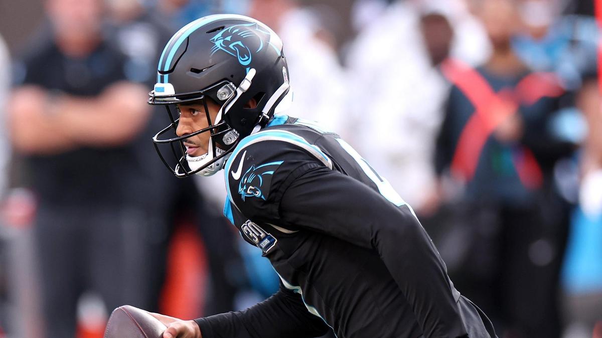 Carolina Panthers quarterback Bryce Young runs for a first down during action against the Kansas City Chiefs at Bank of America Stadium in Charlotte, NC on Sunday, November 24, 2024. The Chiefs defeated the Panthers 30-27.