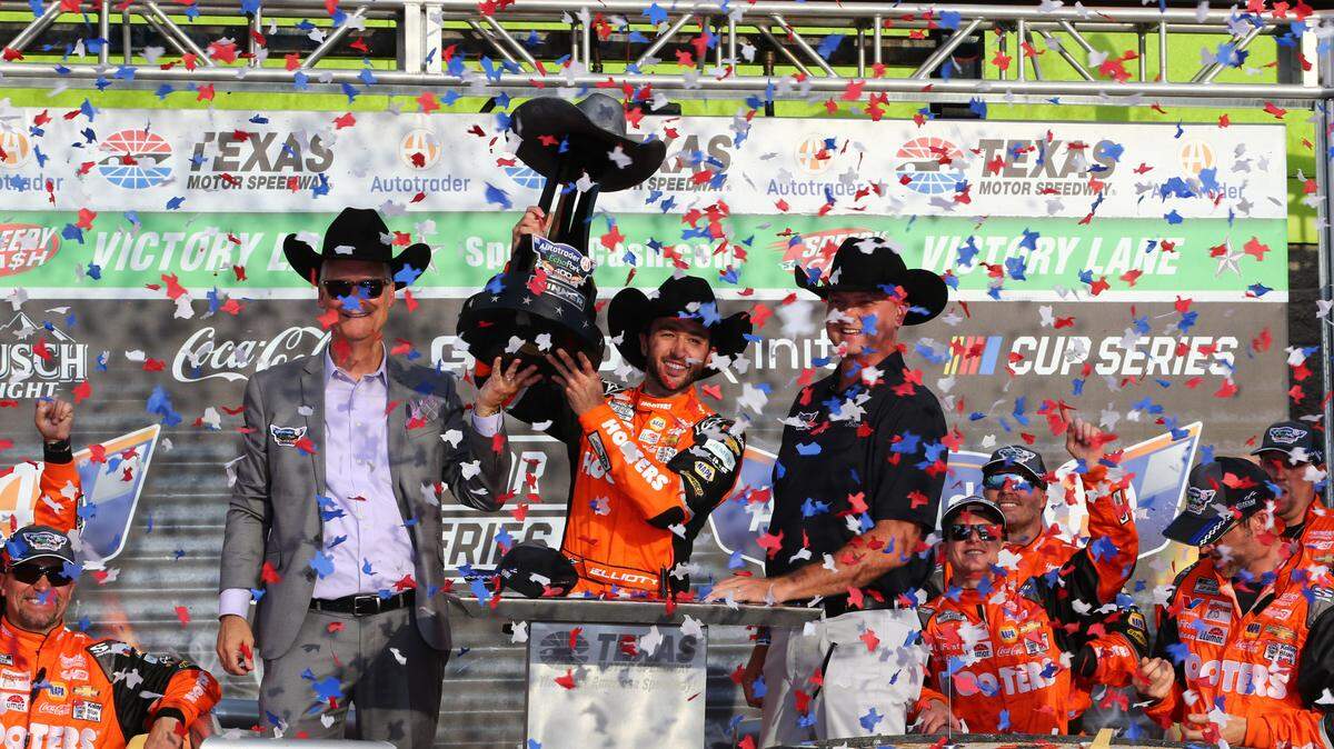 NASCAR Cup Series driver Chase Elliott (9) celebrates in Victory Lane after winning the NASCAR Cup Series AutoTrader EchoPark 400 on Sunday at Texas Motor Speedway in Fort Worth, Texas.