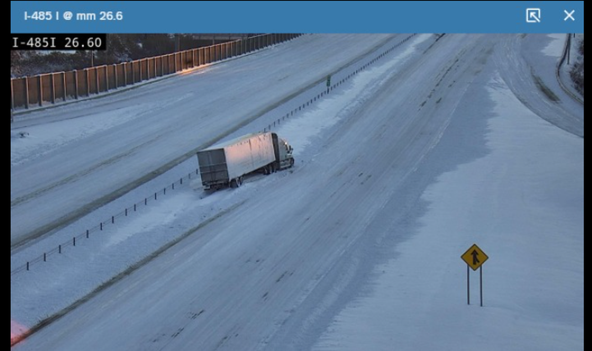 Law enforcement agencies continue to ask people to avoid driving on snow-covered roads. This is an image of Interstate 485 near Prosperity Ridge Road shared on social media by the Huntersville Fire Department.