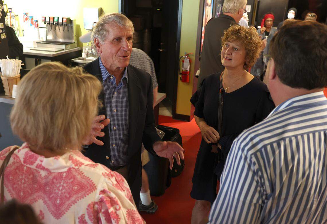 Eastern Flight 212 survivor Bob Burnham, left, speaks with guests following The Charlotte Observer’s 9/11/74 documentary panel discussion at The Independent Picture House in Charlotte on Wednesday, September 18, 2024.