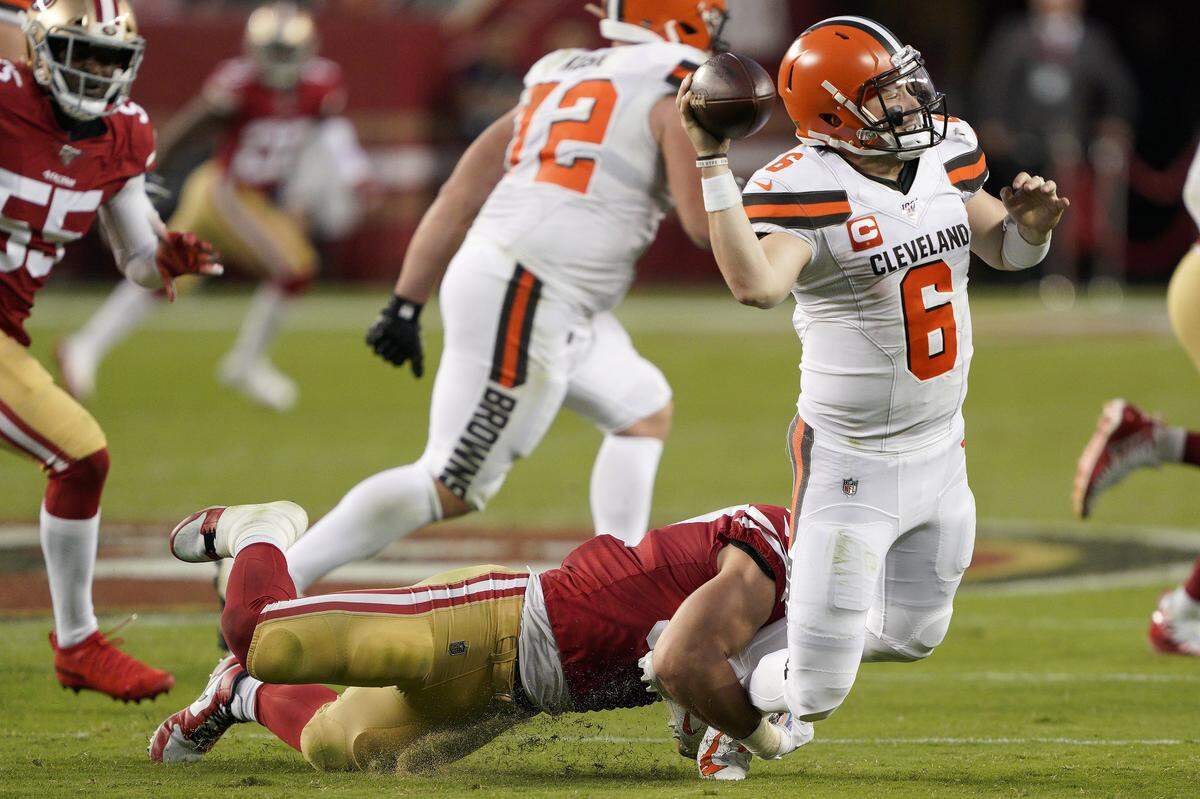 San Francisco defensive end Nick Bosa (diving) is second on the team in sacks, but the 49ers defense overall is one of the NFL’s best.