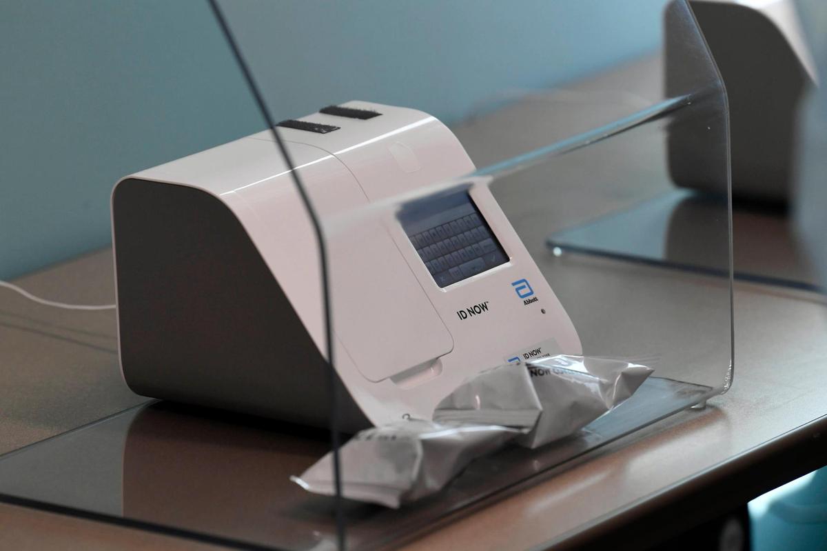 A close-up of an Abbott ID NOW COVID-19 rapid test machine in use at the Michael Jordan Family Medical Clinic in Charlotte on Friday, July 31, 2020. The machines can detect COVID-19 in 13 minutes or less.