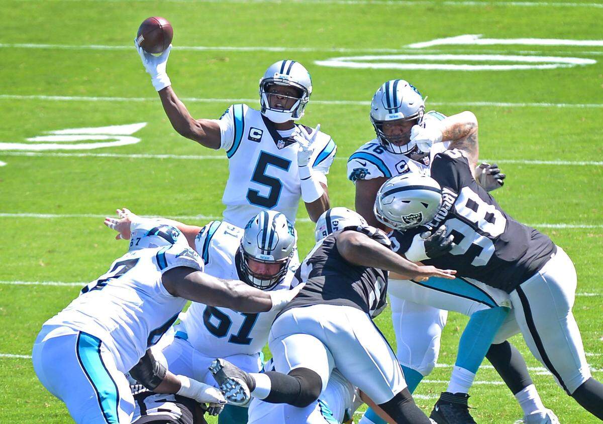 Carolina Panthers quarterback Teddy Bridgewater throws a pass over the middle during his first game for the team on Sept. 13, 2020.