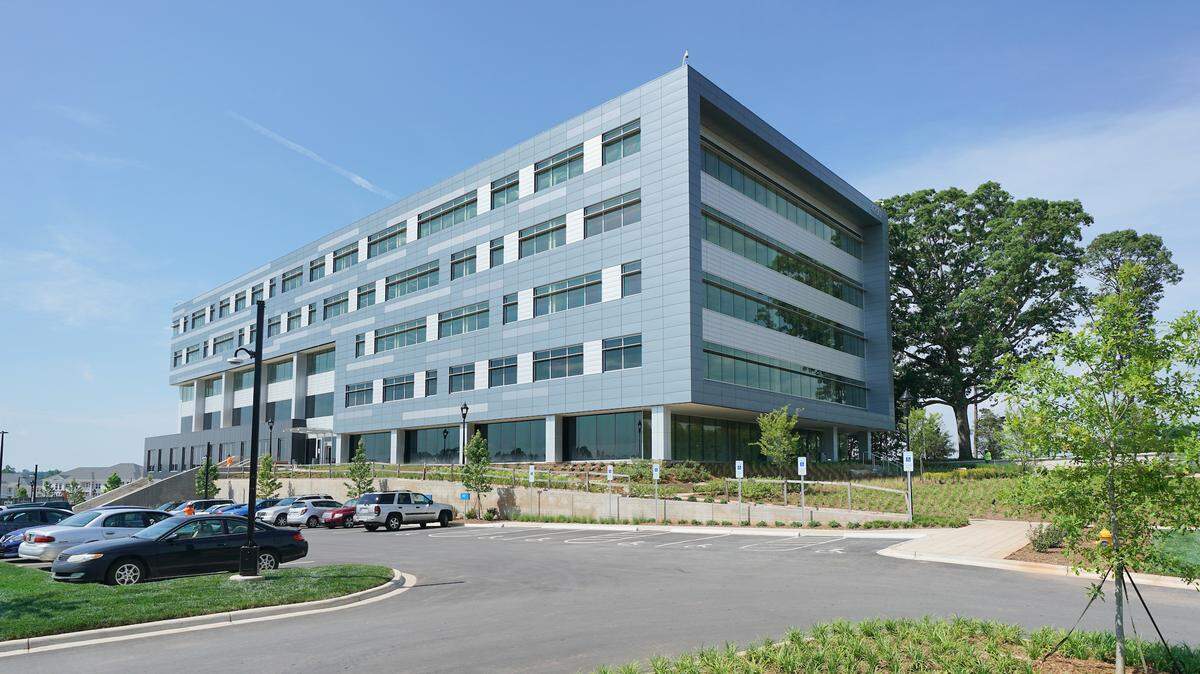Corning Optical is investing $150 million in expanding its Catawba County operations, Gov. Roy Cooper announced Tuesday. The manufacturer’s headquarters, pictured here, are in Charlotte.