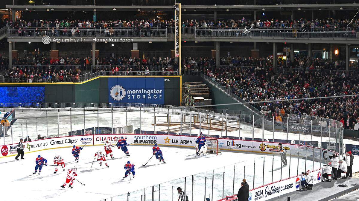 The right field stands provide a backdrop as fans watch the Charlotte Checkers battle the Rochester Americans during the 2024 Queen City Outdoor Classic at Truist Field in uptown Charlotte, NC on Saturday, January 13, 2024.