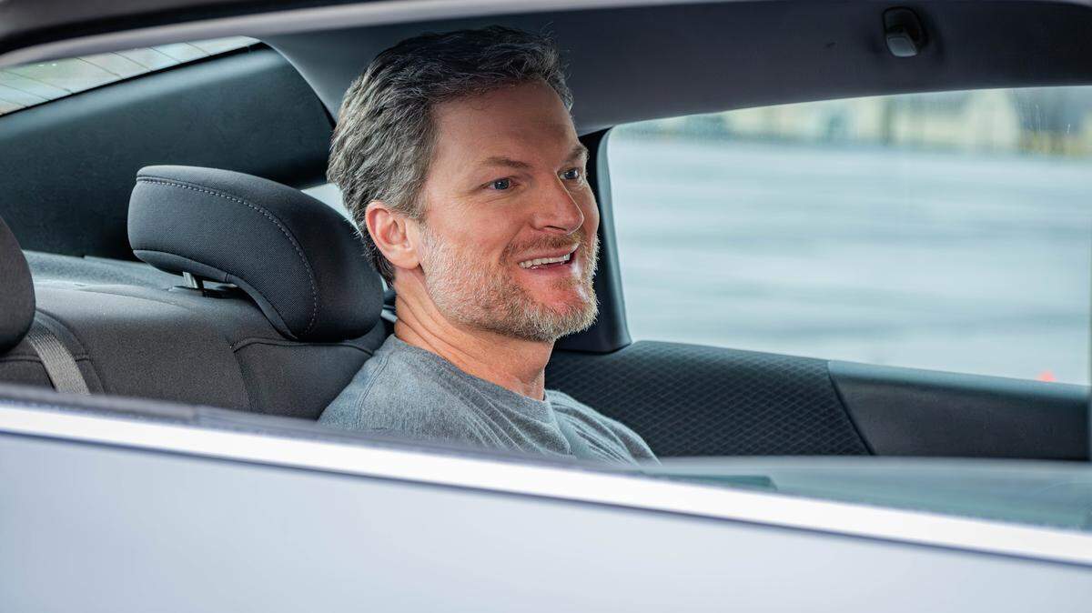Dale Earnhardt Jr. rides as a passenger as teenage driver Allie Miller navigates an obstacle course set up by BRAKES, an organization which aims to make teenagers better drivers who understand not to look at their phone while behind the wheel.
