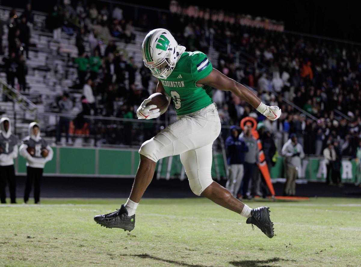 Weddington’s Aiden Harris runs off the right side for a touchdown a 2024 game. 