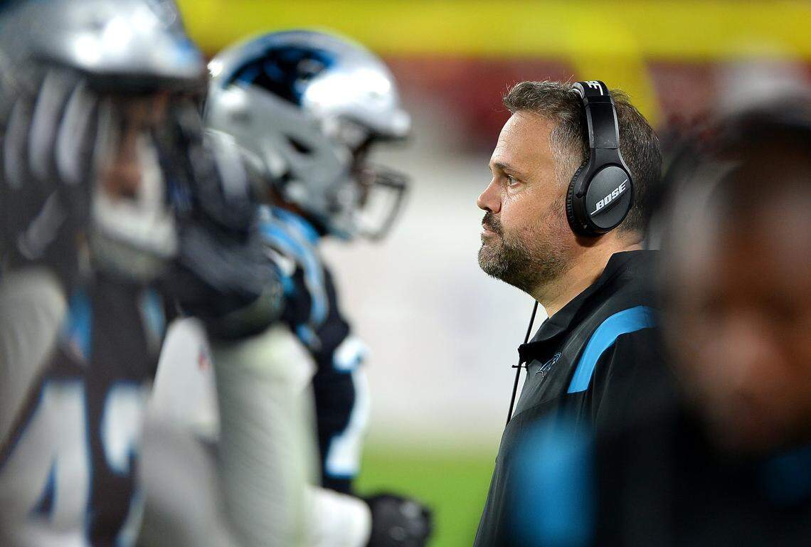 Carolina Panthers head coach Matt Rhule stands along the sideline staring onto the field following a turnover during fourth quarter action against the Tampa Bay Buccaneers at Raymond James Stadium in Tampa, Fl. on Sunday, January 9, 2022. The Panthers lost to the Buccaneers 41-17.