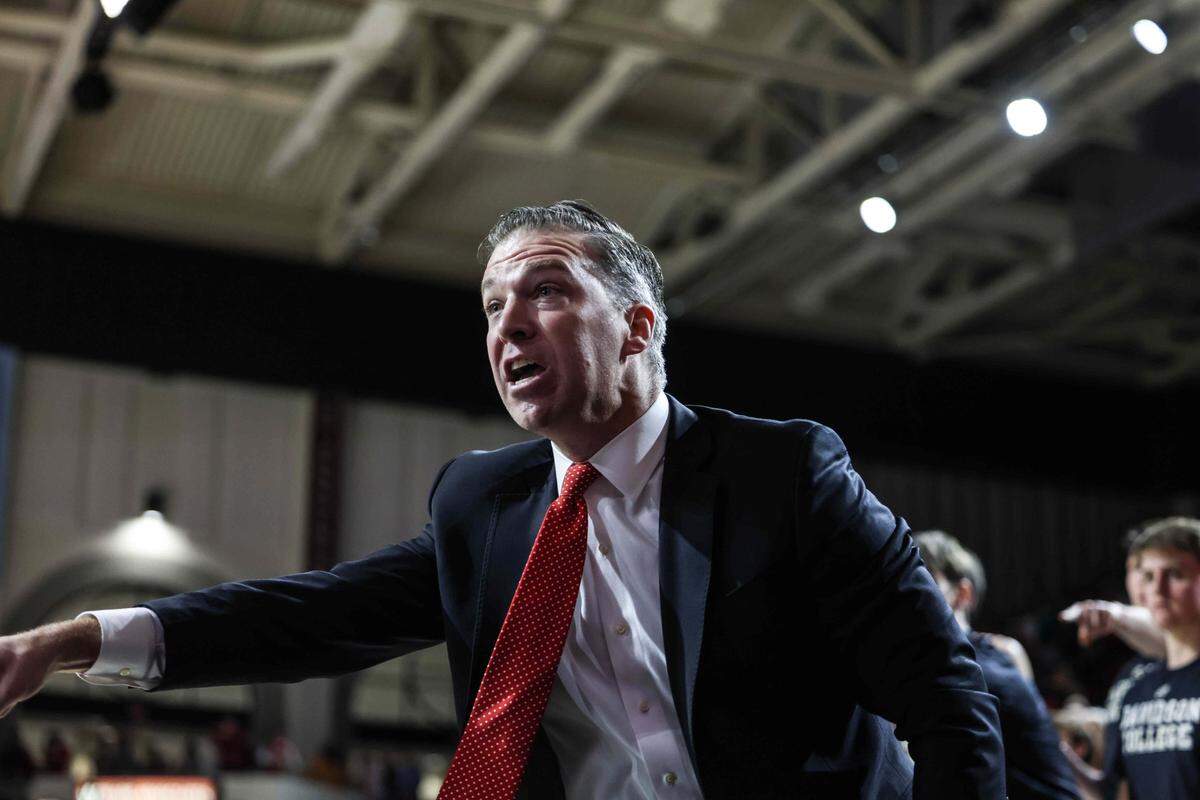 Davidson Wildcats coach Matt McKillop coaches at the John M. Belk Arena in Davidson, N.C., on Saturday, February 11, 2023.