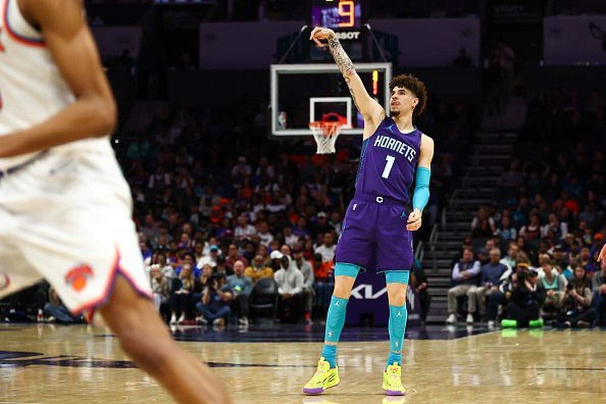 LaMelo Ball #1 of the Charlotte Hornets watches his shot during the first half of a basketball game against the New York Knicks at Spectrum Center on March 20, 2025 in Charlotte, North Carolina.