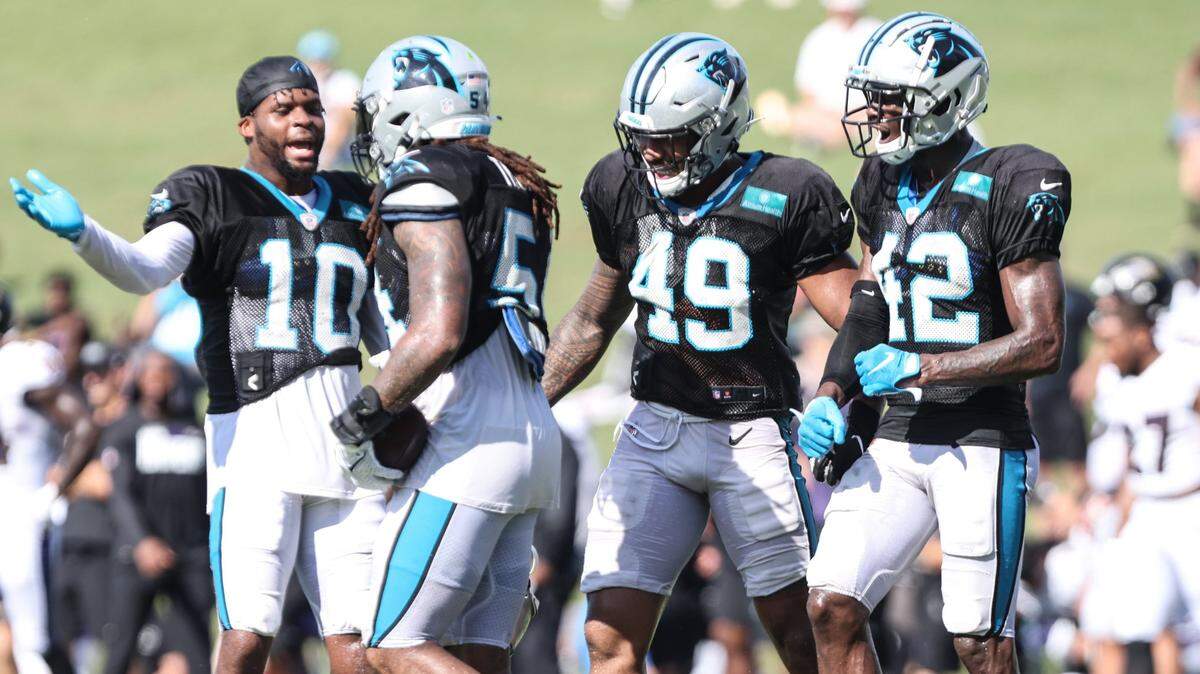Carolina Panthers players celebrate during the joint practice with the Baltimore Ravens in Spartanburg, S.C., on Thursday, August 19, 2021.
