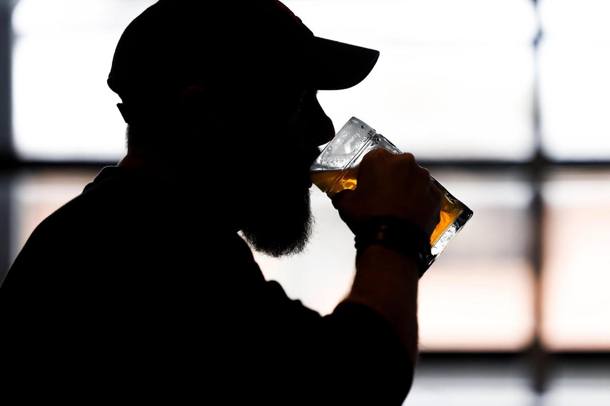 Chris Stevens, of Charlotte, N.C. drinks a stein of More Than A Pils pilsner at Gilde Brewery in Charlotte, N.C. Thursday, March 10, 2022. Gilde has been brewing beer in Hanover, Germany, since the 1500s and opened this location in Charlotte in early 2022.