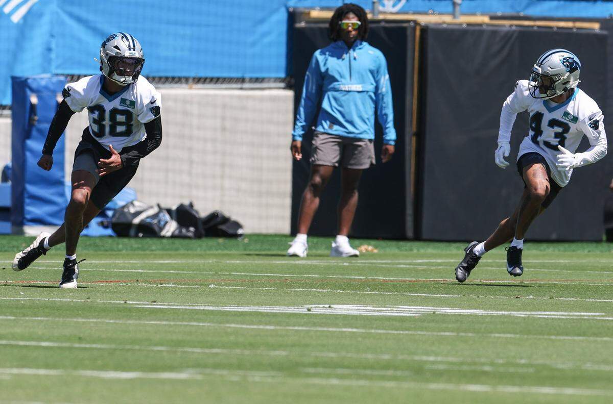 Defensive backs Zakee Wheatly, left, and DeVonta Smith take part in Carolina Panthers rookie minicamp on Friday, May 8, 2026.