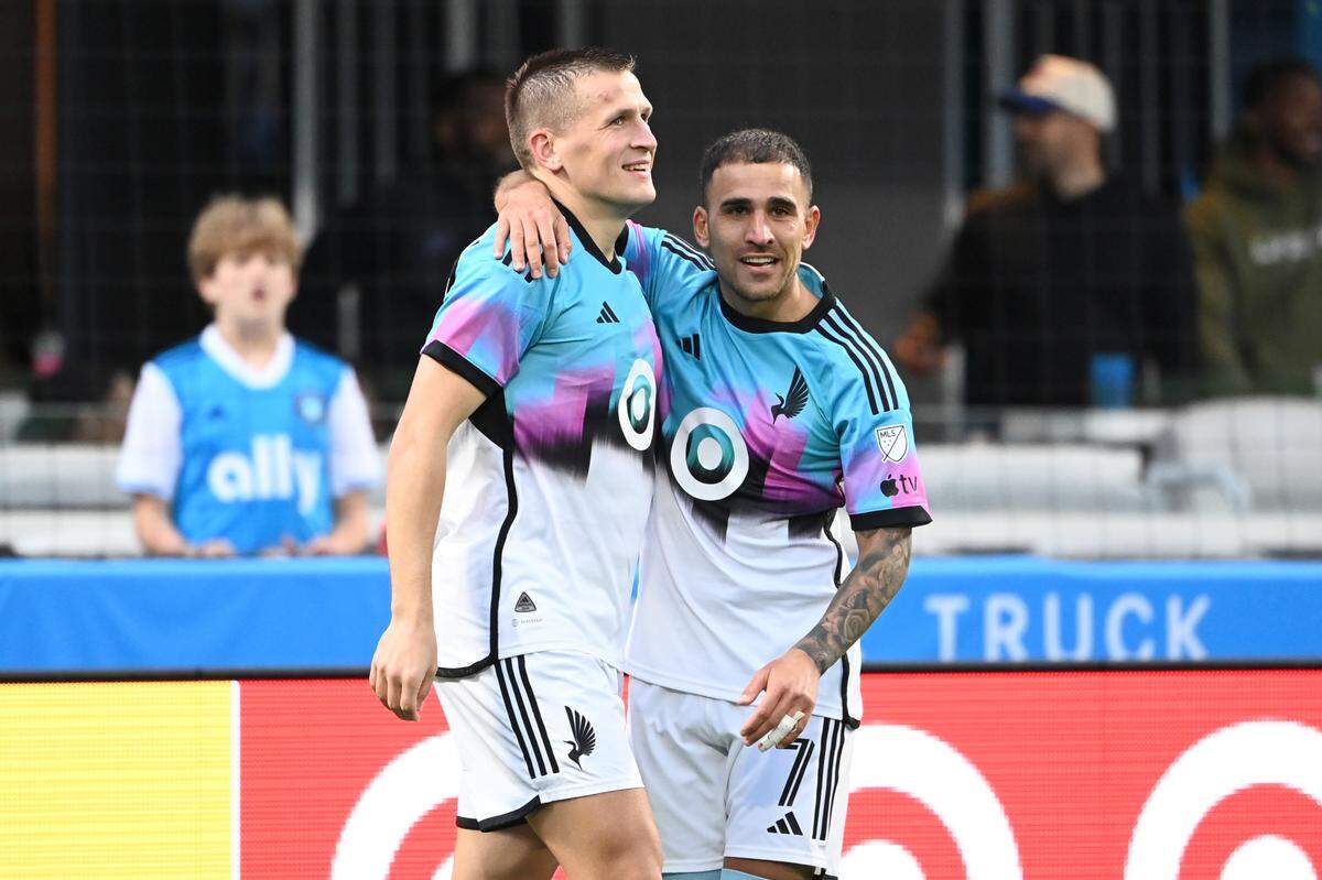 Minnesota United midfielder Robin Lod (17) celebrates with midfielder Franco Fragapane (7) after scoring a goal against Charlotte FC in Sunday’s second half at Bank of America Stadium. Bob Donnan-USA TODAY Sports