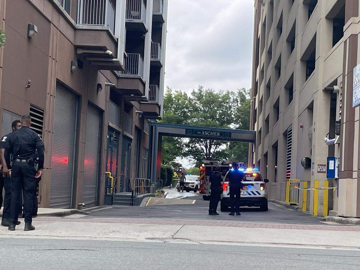 Charlotte-Mecklenburg Police officers are in the 600-block of N. Church Street near W. Tenth Street where a fellow officer was shot in the leg while responding to a domestic dispute.