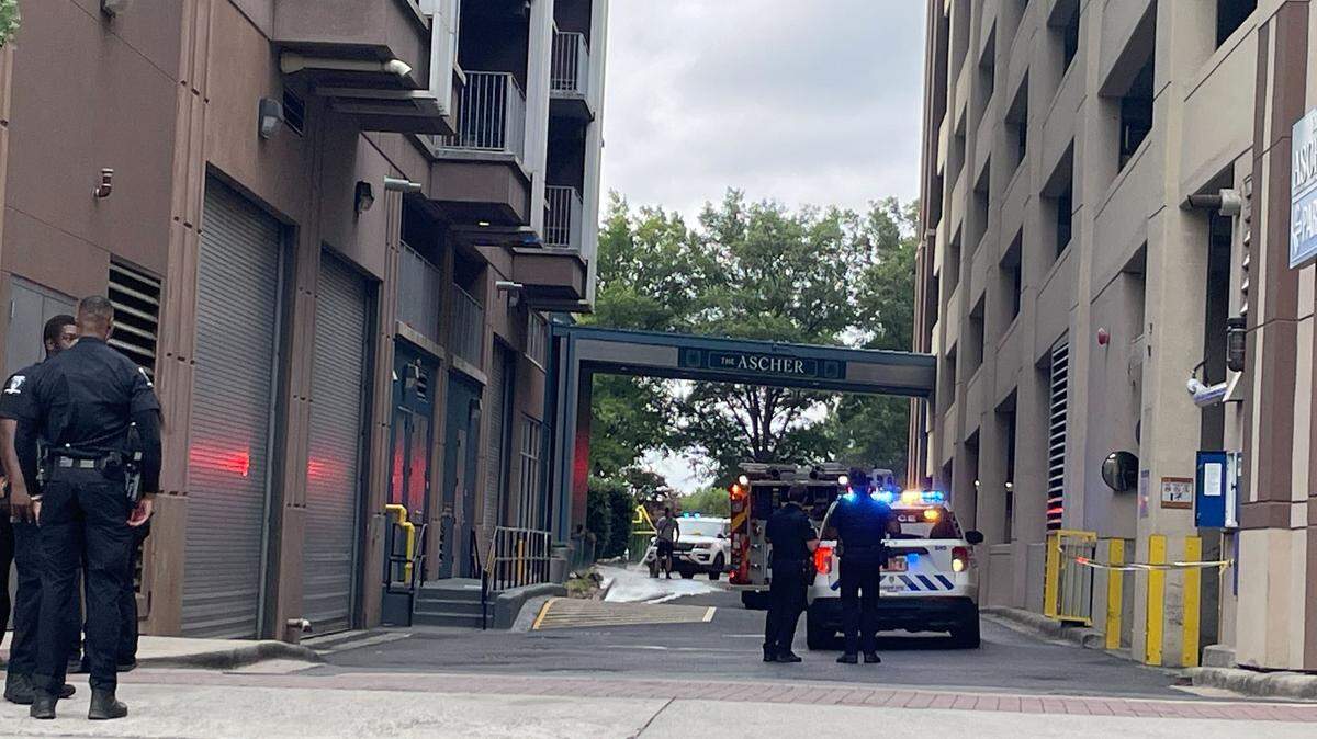Charlotte-Mecklenburg Police officers are shown here on North Church Street on Sunday, July 6, 2025, after a fellow officer was shot in the leg while responding to a domestic dispute.