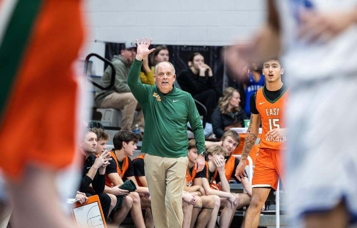East Lincoln Mustangs coach Jon Hancock coaches against the Maiden Blue Devils at Maiden High School in Maiden, N.C., on Monday, January 12, 2025.