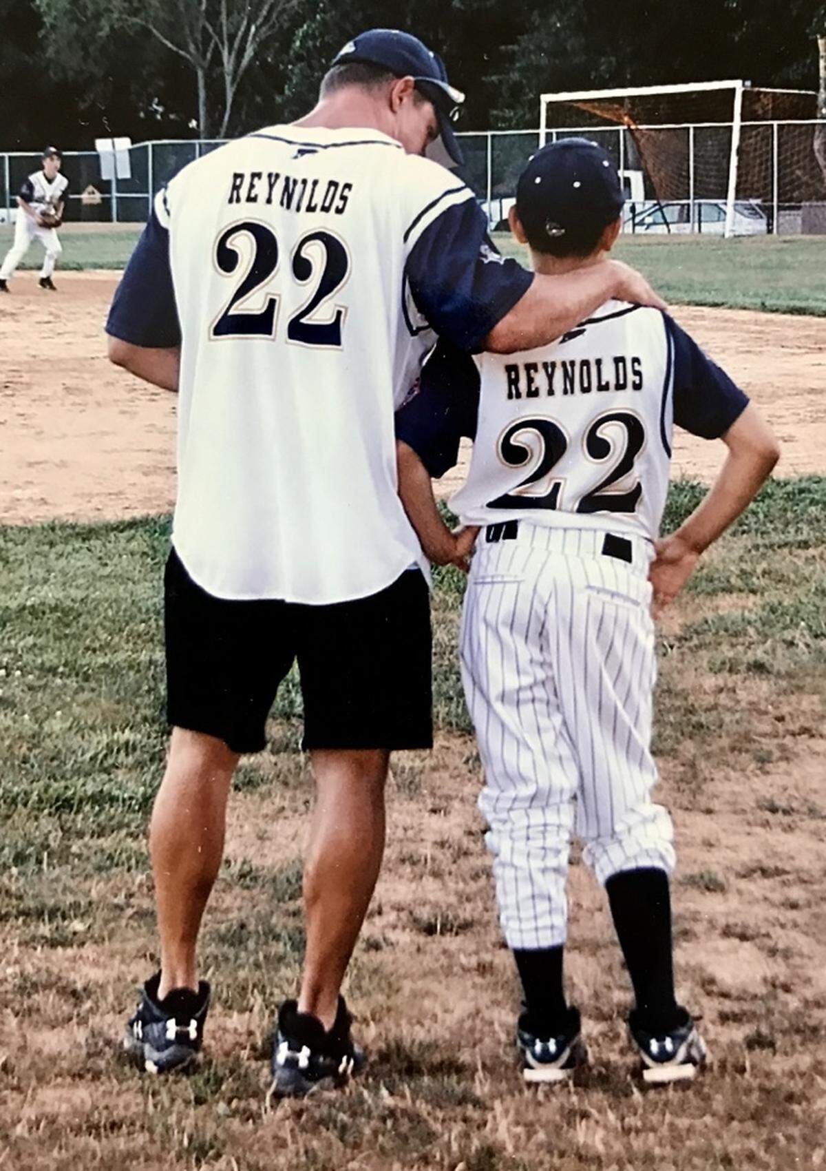 Dan Reynolds (left) coached his son Chris for years in baseball. Chris Reynolds eventually became the Charlotte 49ers’ starting quarterback.