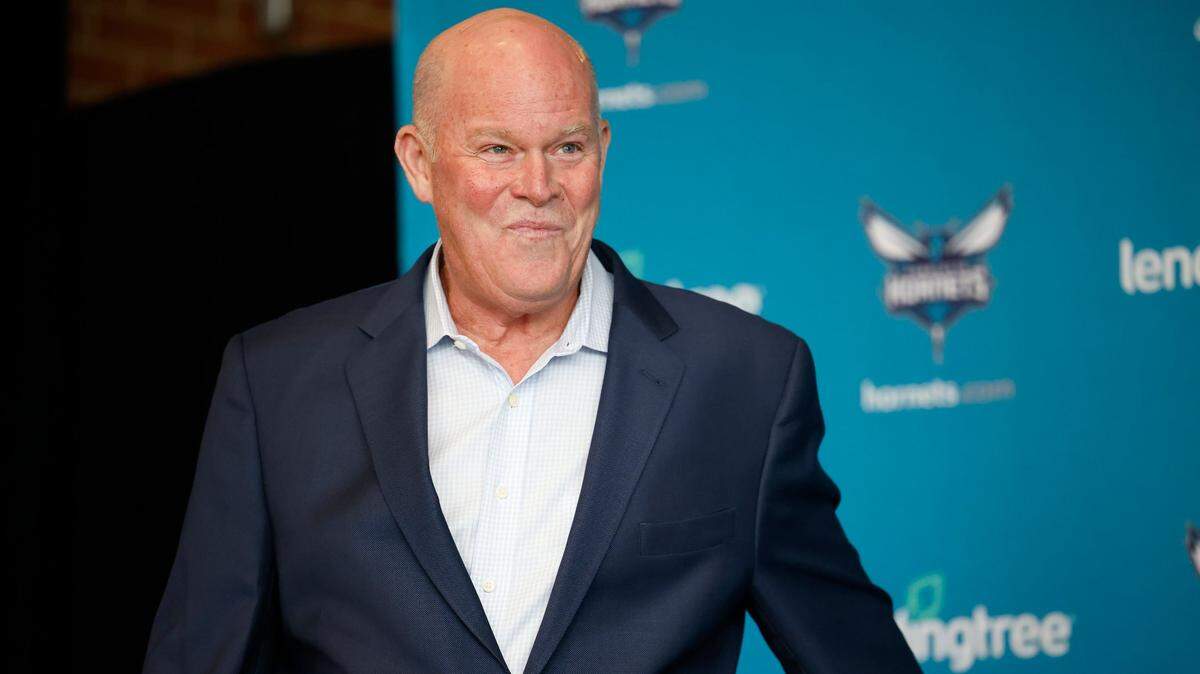 New Charlotte Hornets head coach Steve Clifford smiles as he takes the podium for a media conference at Spectrum Center in Charlotte, N.C., Tuesday, June 28, 2022.