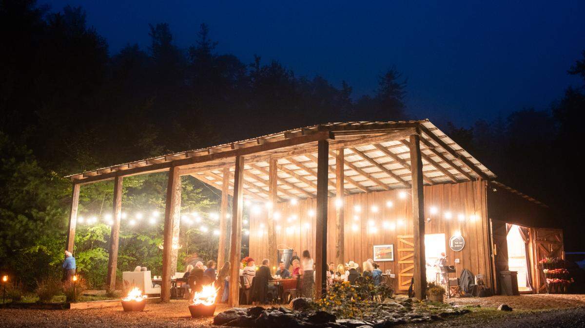 Wildhaven Farm & Forest Retreat offers outdoor dining that celebrates local farmers and ranchers.