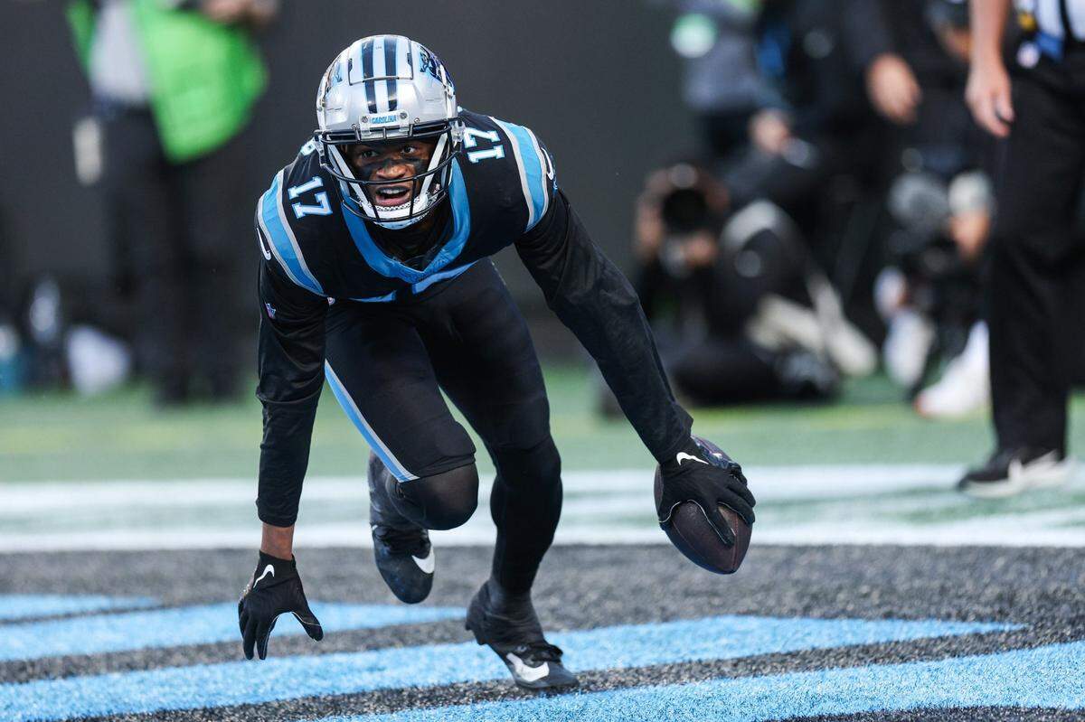 Carolina Panthers wide receiver DJ Chark Jr. (17) celebrates a touchdown in the end zone during the game against the Packers at Bank of America Stadium on Sunday, December 24, 2023.