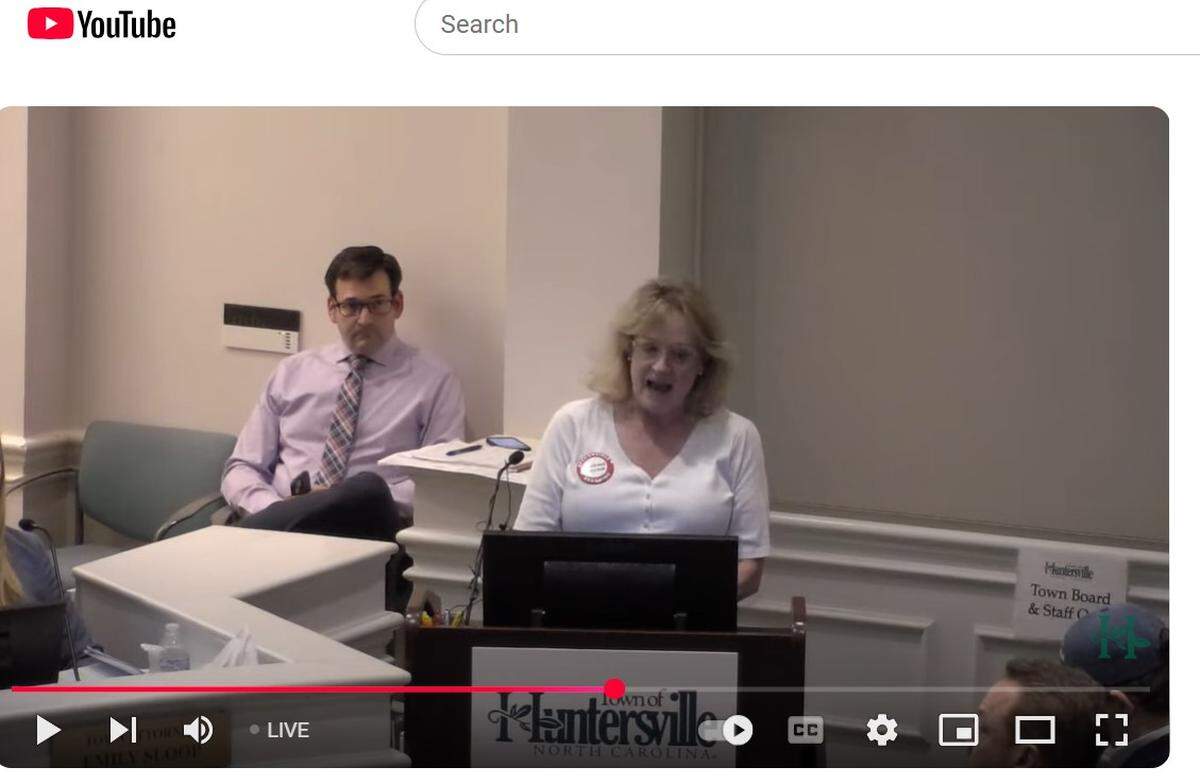 Longtime Huntersville resident Cynthia Mitchell joined at least 12 other residents in speaking against the planned expansion of Birkdale Village on Tuesday night, March 18, 2025.
