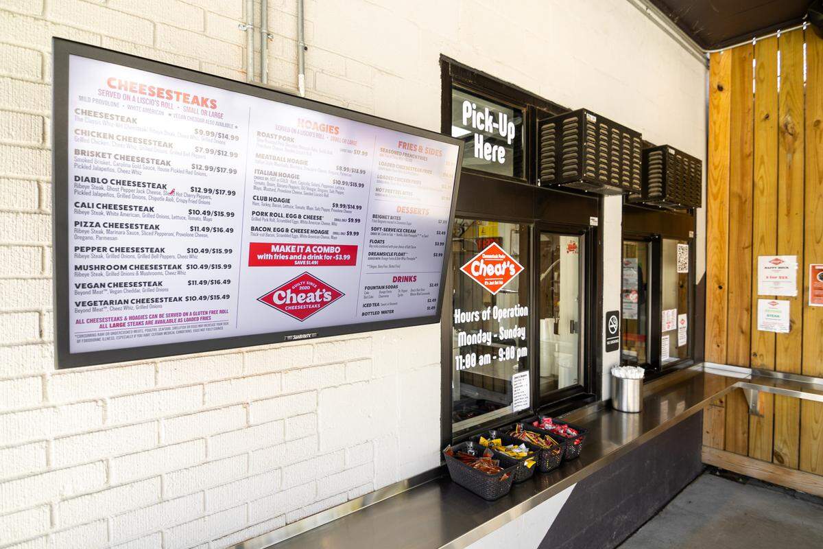 Cheat’s Cheesesteaks walk-up window on Pecan Avenue.