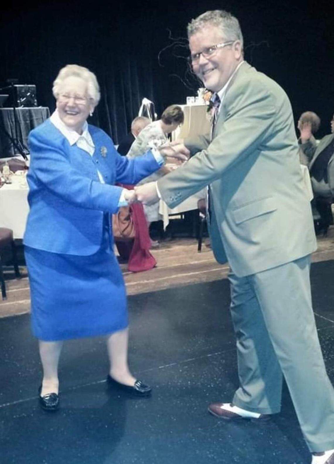 Peggy Wall and her son, Tim, danced at a wedding in 2017 - the year before she had to enter a nursing home.