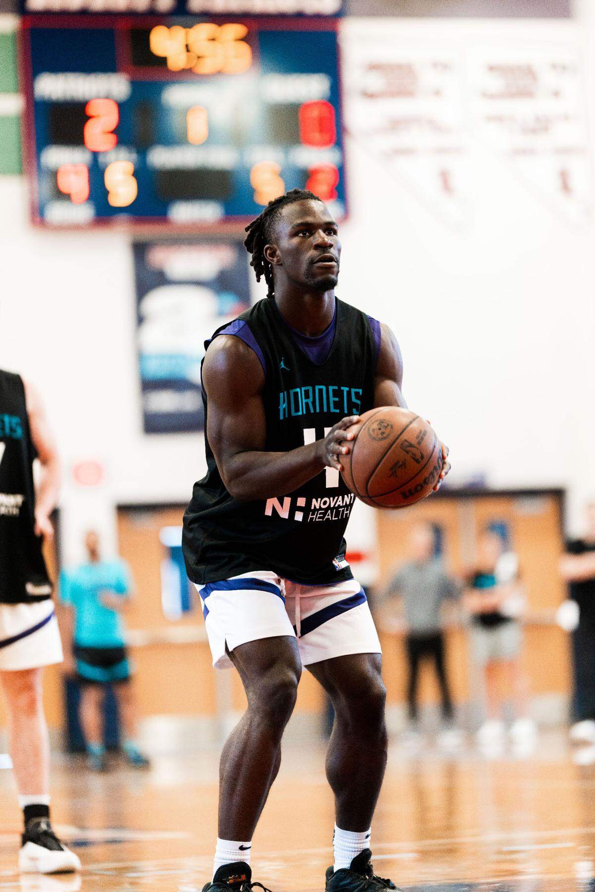Sion James shoots free throws during Charlotte Hornets summer league practice in Las Vegas.