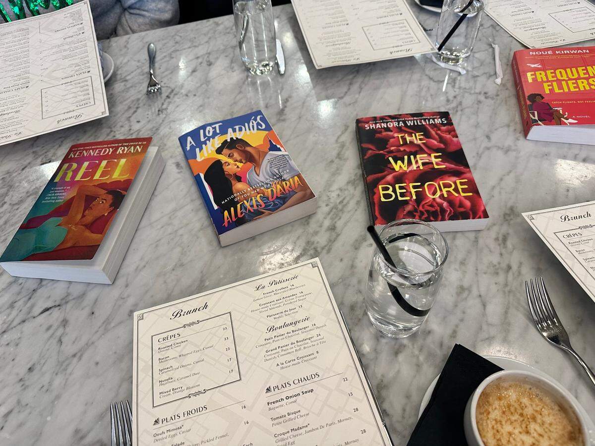 Books like ‘Reel’ by Kennedy Ryan and ‘The Wife Before’ by Shanora Williams were swapped during one of Sista Story Society’s monthly meetings.