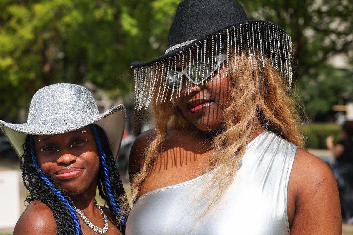 Keylichon McNair, 17, left, and Jacoya Tarver, 17, of Salisbury, pose before seeing Beyonce tonight at Bank of America Stadium on Wednesday, August 9, 2023 in Charlotte, NC. “We were too young to go to her [Beyonce] other shows, but now we’re grown and we’re here!” says McNair about her excitement to see Beyonce perform.