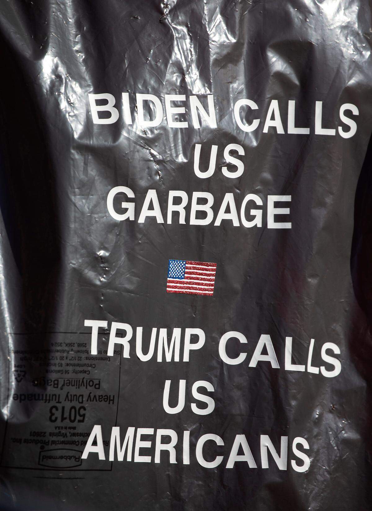 Supporters of former President and Republican presidential candidate Donald Trump gather outside First Horizon Coliseum prior to a campaign rally in Greensboro, N.C. on Saturday, Nov. 2, 2024.