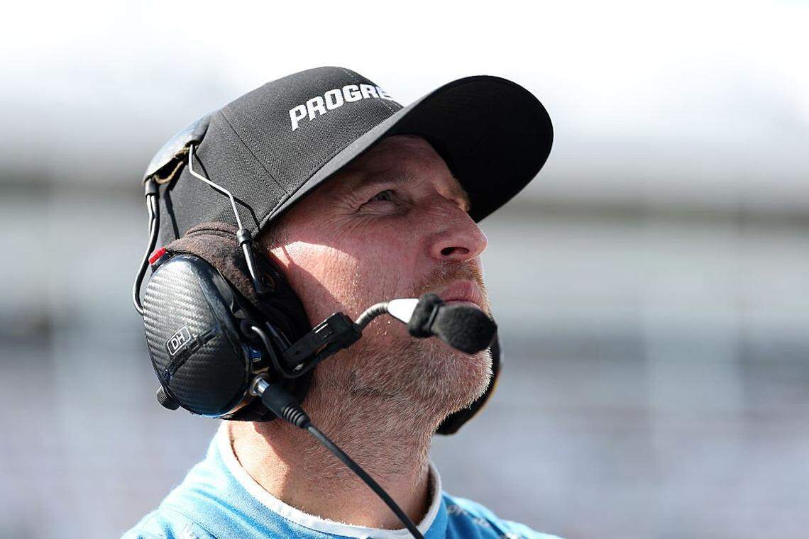 CONCORD, NORTH CAROLINA - OCTOBER 04: Denny Hamlin, driver of the #11 Progressive Toyota, looks on during qualifying for the NASCAR Cup Series Bank of America ROVAL 400 at Charlotte Motor Speedway on October 04, 2025 in Concord, North Carolina. (Photo by Jordan Bank/Getty Images)