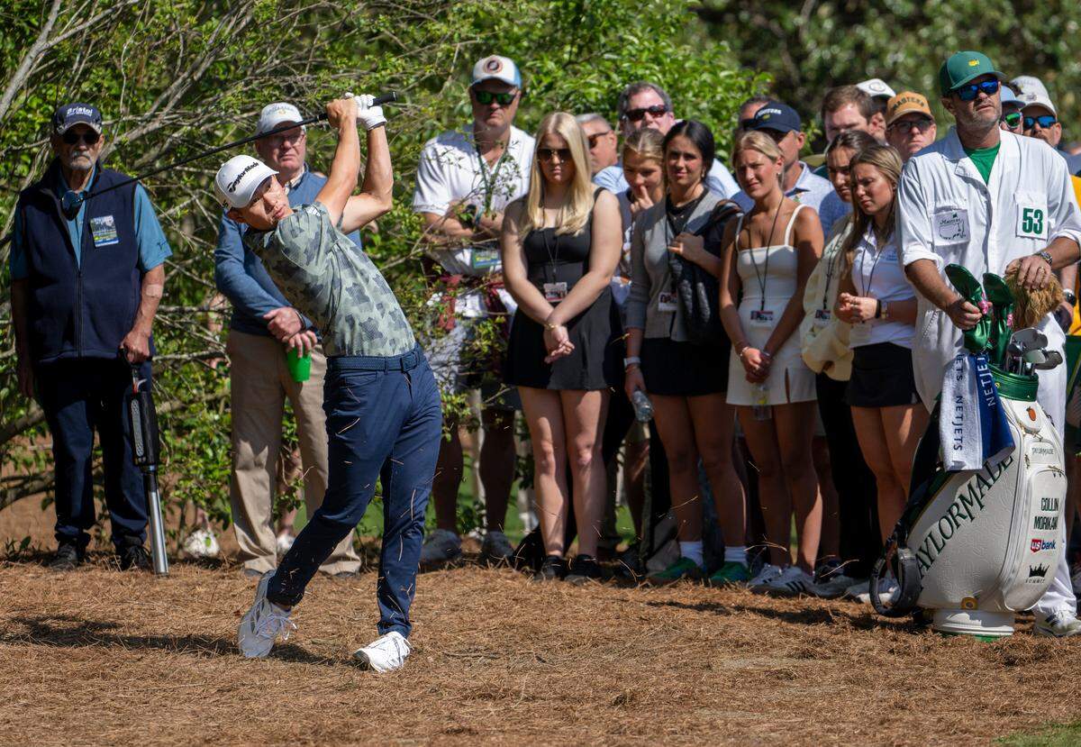 Collin Morikawa of the United States hits a stroke from the pine straw on No. 5 during the first round of the Masters at Augusta National Golf Club, Thursday, April 10, 2025.