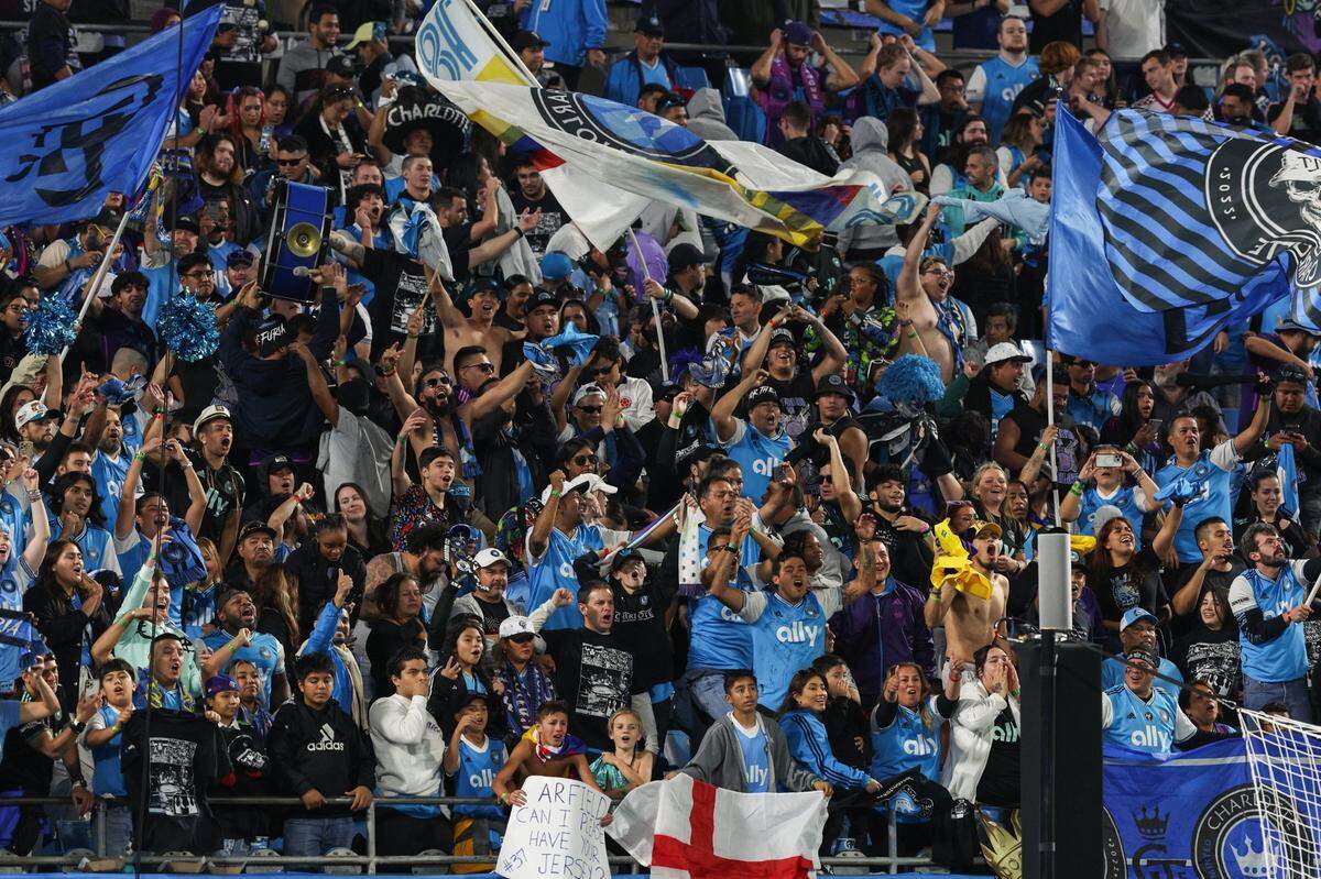 Fans in the stands celebrate Charlotte FC’s 1-0 victory over Inter Miami at Bank of America Stadium on Saturday, October 21, 2023 in Charlotte, NC. With the win, Charlotte FC clinches a spot in the playoffs.