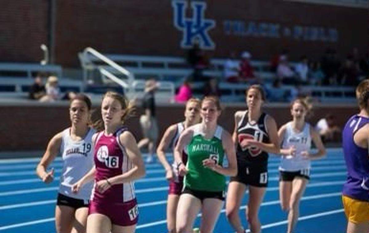 Taylor Barefoot (then Taylor Pryde) runs for Aquinas College, during a track meet she participated in as a scholarship athlete for the Grand Rapids, Michigan school.