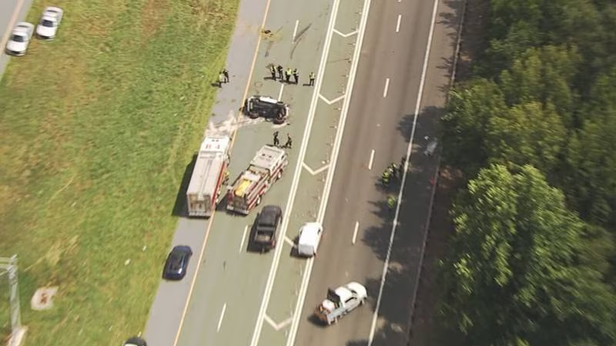A northbound car jumped Interstate 77’s median killing one, injuring two and closing down the highway near Huntersville, N.C., Friday, July 21, 2023,