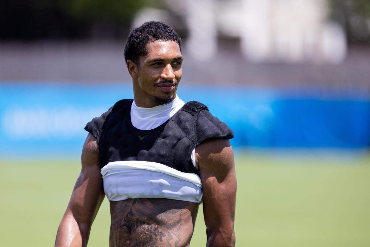 Jul 26, 2025; Charlotte, NC, USA; Carolina Panthers running back Chuba Hubbard (30) walks off after practice at training camp. 