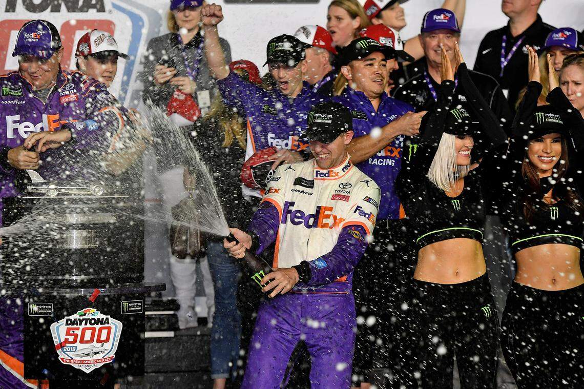 Feb 17, 2019; Daytona Beach, FL, USA; NASCAR Cup Series driver Denny Hamlin (11) celebrates after winning the Daytona 500 at Daytona International Speedway. Mandatory Credit: Jasen Vinlove-USA TODAY Sports